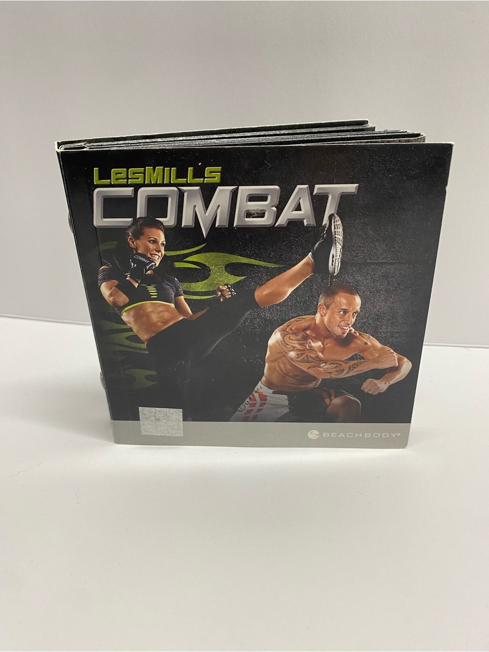 ^ Les Mills COMBAT Beachbody 5-DVD Base Workout Set - MMA Fitness